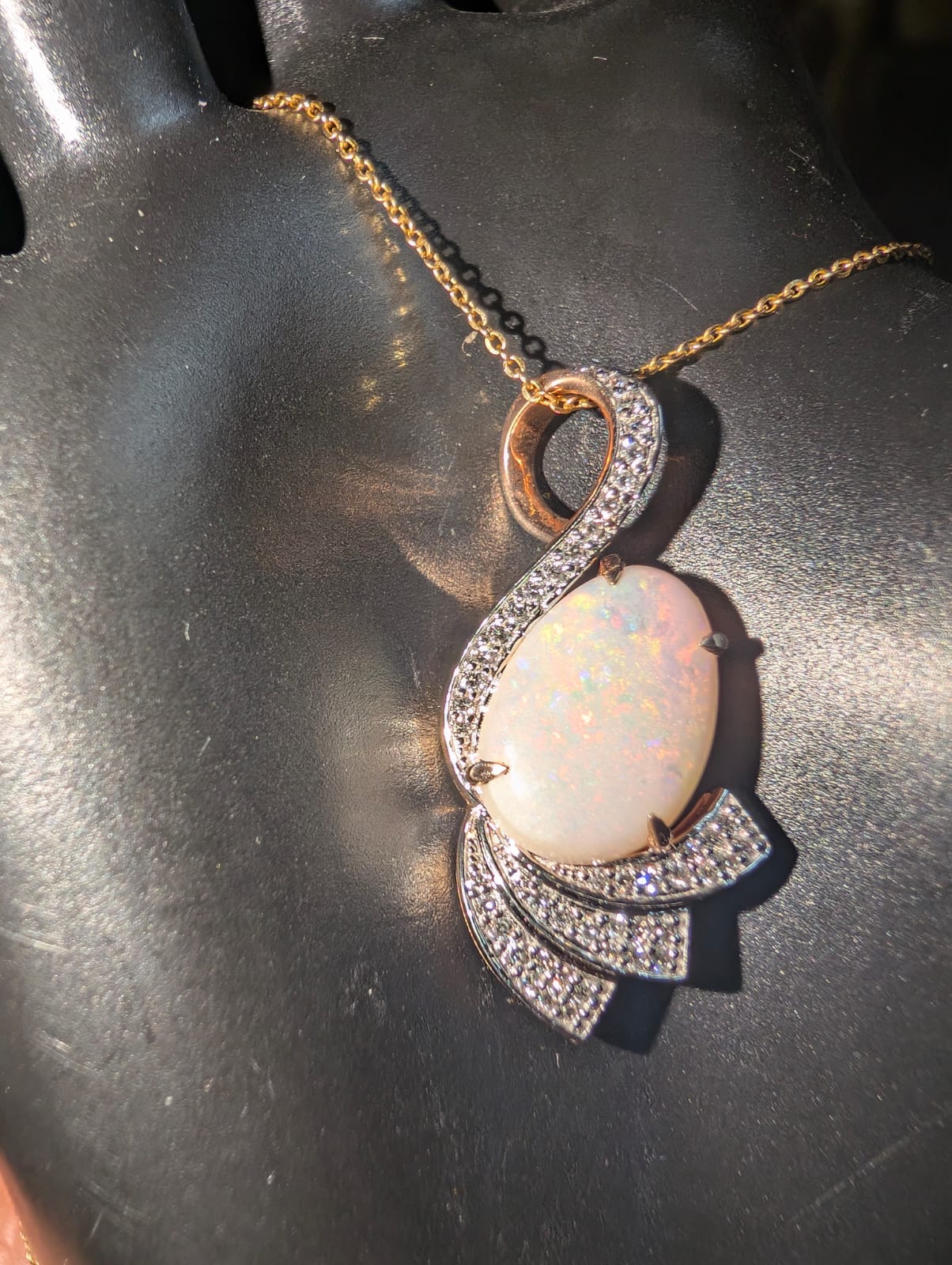 Elegant White Opal Pendent set in 14kt Gold