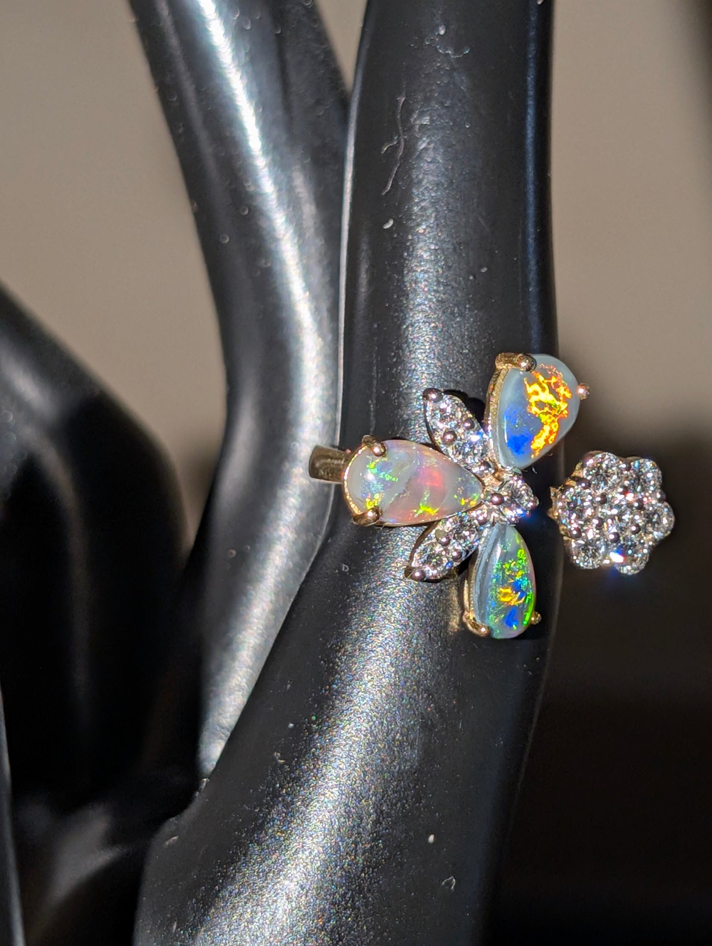 Elegant Black Opal Ring with Radiant CVD Diamonds Set in 10kt Gold