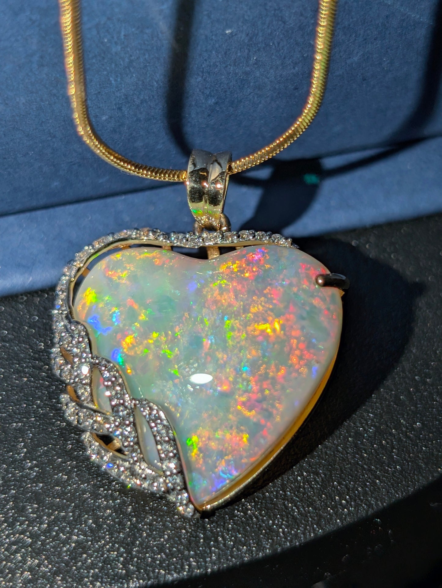 18KT Gold Embraced in Fine Heart Shaped Coober Pedy Crystal Opal with 31 CVD Diamonds