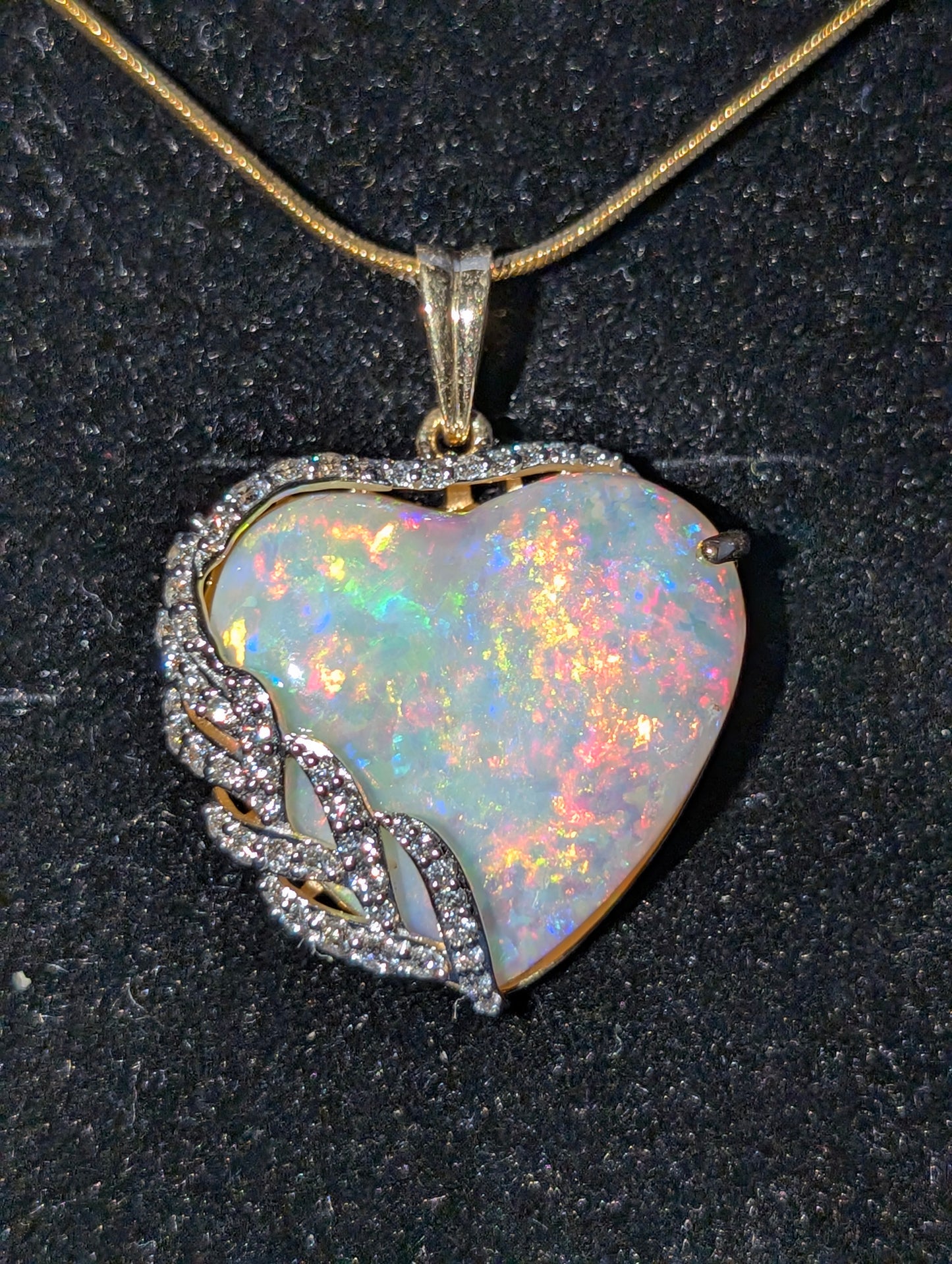 18KT Gold Embraced in Fine Heart Shaped Coober Pedy Crystal Opal with 31 CVD Diamonds