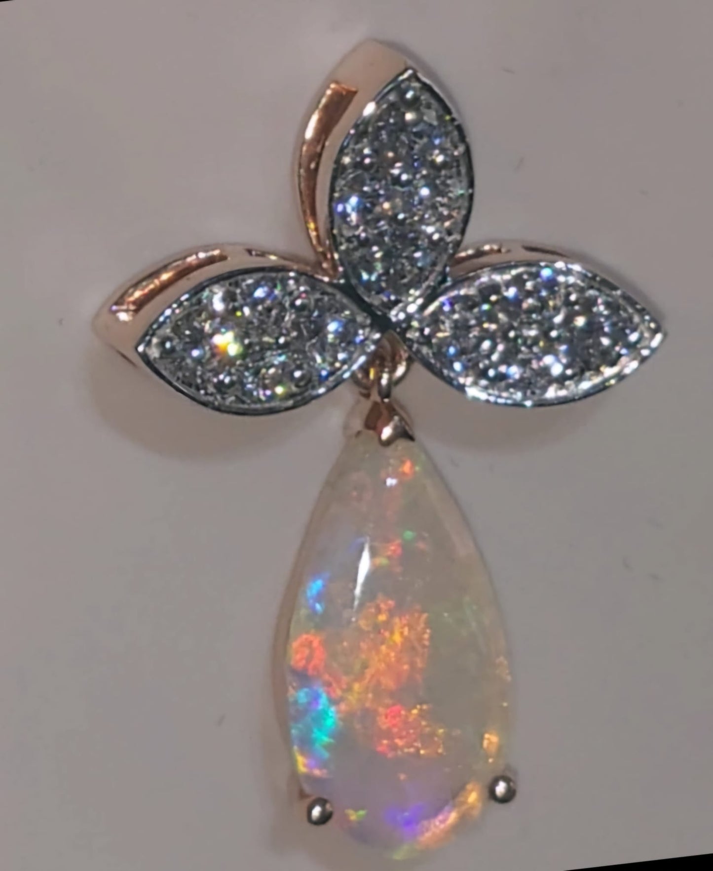 Captivating Coober Pedy Jelly Crystal Opal and 12 CVD Diamonds set in 14ct Rose Gold