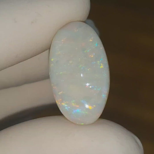 7.1ct Coober Pedy White Opal with Sparkling Red, Blue, Orange and Green colours